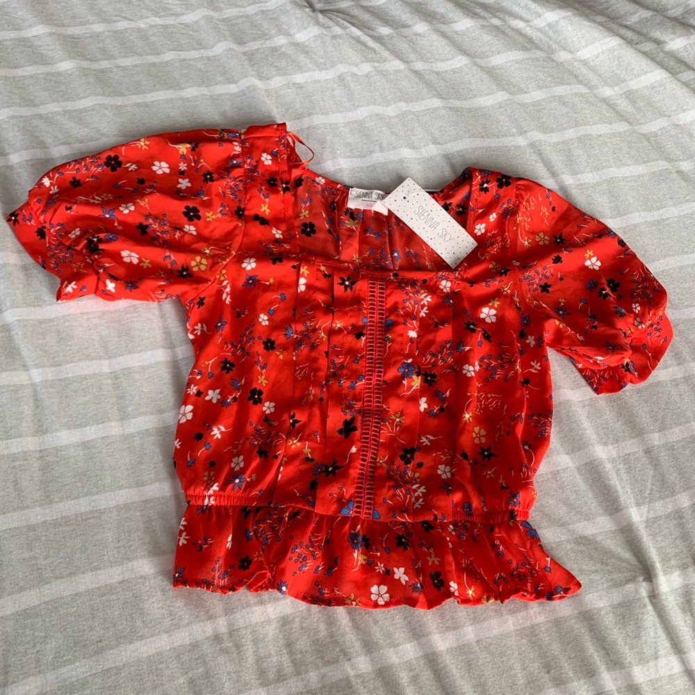 Sienna Sky puff sleeve crop top. Brand new.